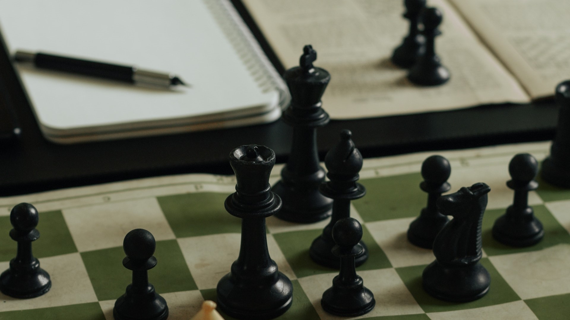 Image of chess board and writing journal